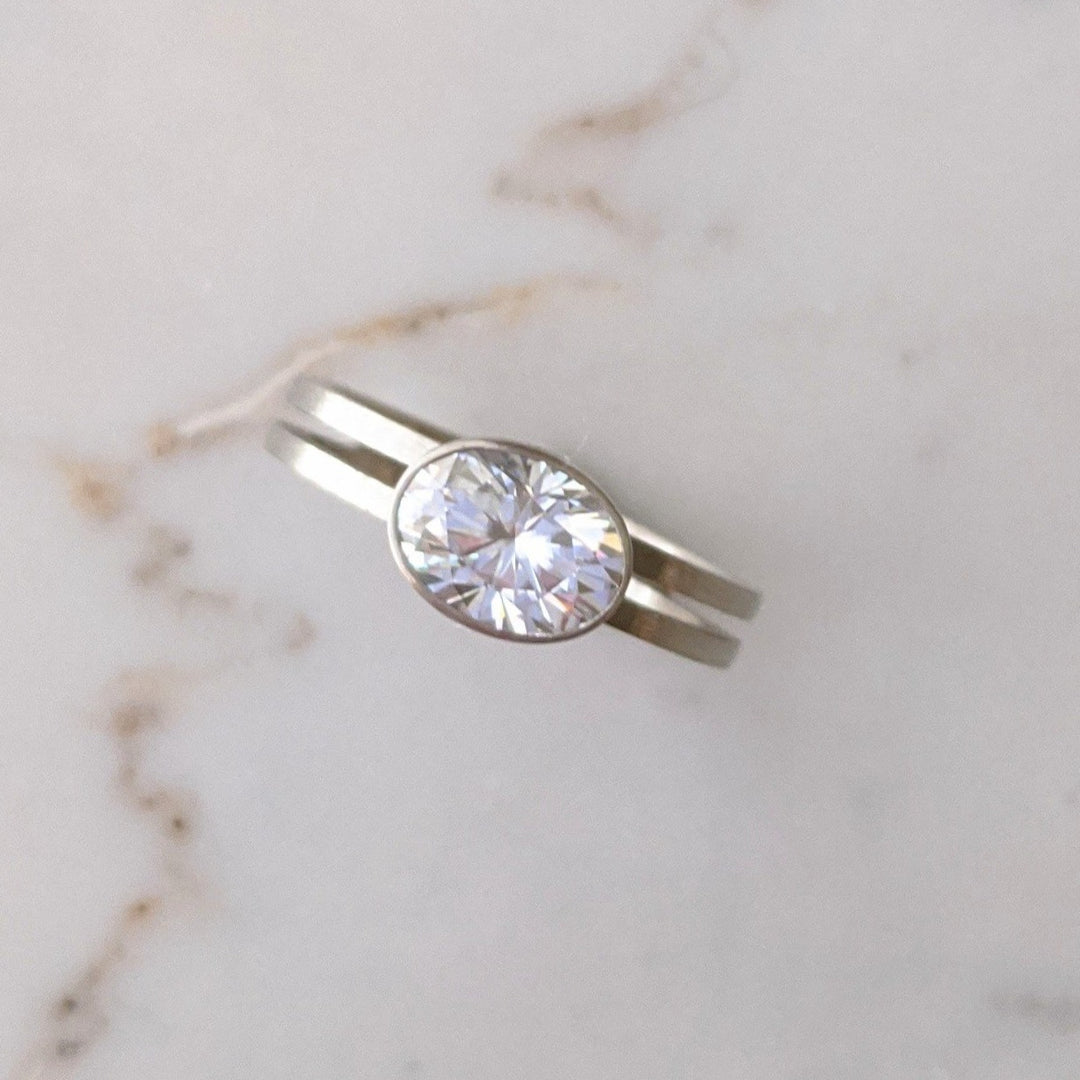 East + West Oval Moissanite Double Band Ring