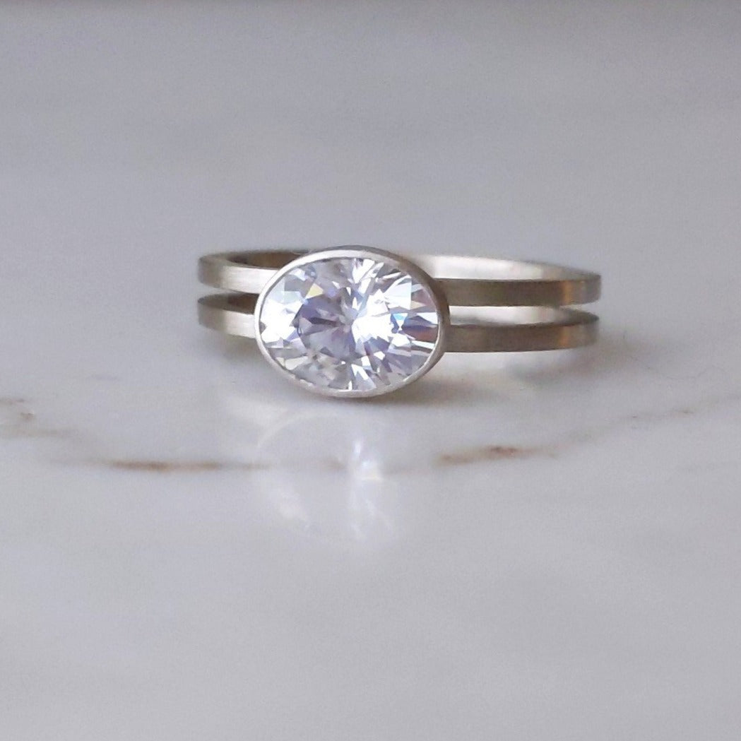 East + West Oval Moissanite Double Band Ring